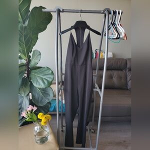 CLEARANCE: Silence + Noise Black Sleeveless Jumpsuit With Cutout Back Design